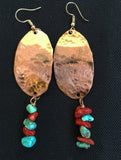 Solid hammered oval with turquoise and coral beading at bottom