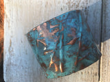 Turquoise colored 1 7/8 inch form-folded copper cuff