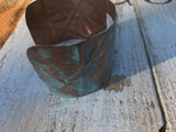 Turquoise colored 1 7/8 inch form-folded copper cuff