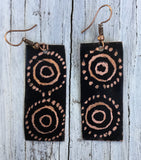 black rectangle earring aborigine design etched into piece