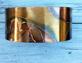 1 inch flamed copper cuff where ever the flame went I etched around that pattern