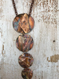 Cascading 4 circle necklace flame painted copper necklace